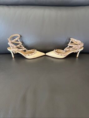 Valentino Garavani Rockstud Pointed-Toe Strappy Pumps in Beige